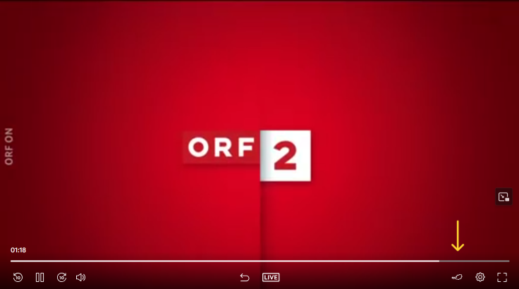 "A screenshot of ORF's video player showing the text "ORF2" in front of a red background. In the bottom right corner are 3 different buttons. Highlighted with an arrow is the one that's shaped like Austria."